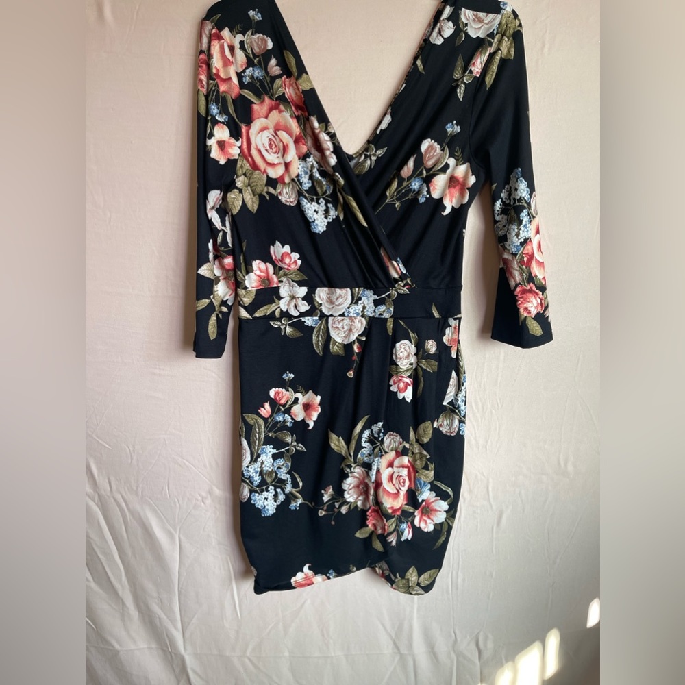 Mini black dress with floral pattern